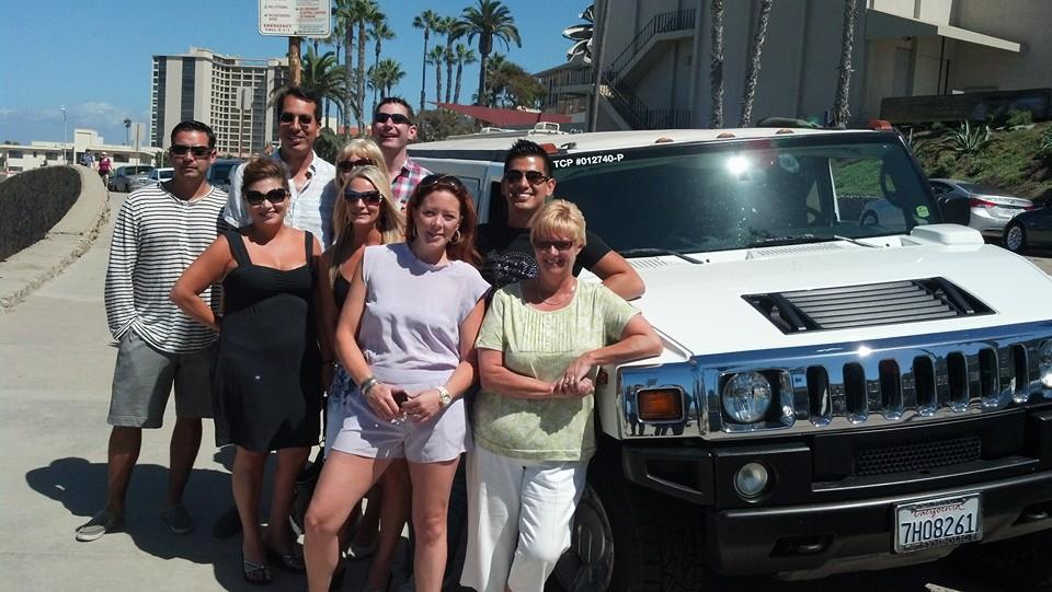 9 friends see the sights in San Diego in a white hummer limo