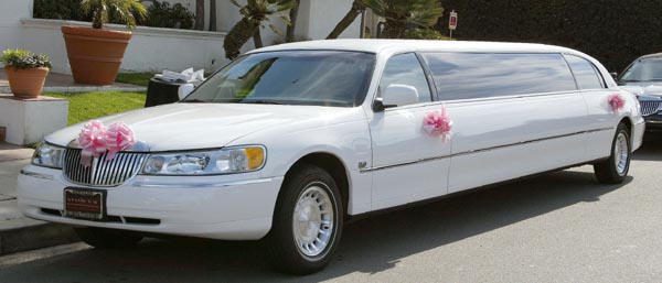White Lincoln Continental Limo 8 Passenger left front view