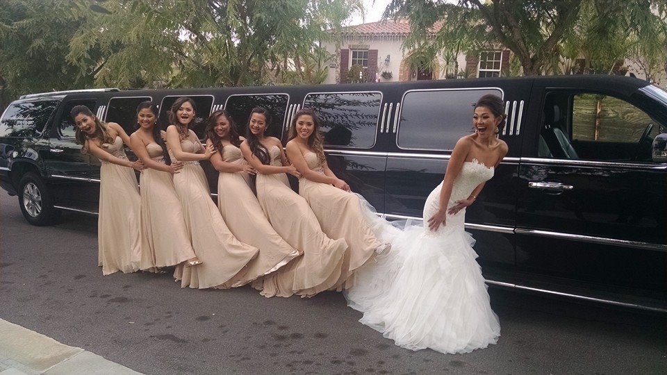 Bride and six bride's maids having fun before wedding