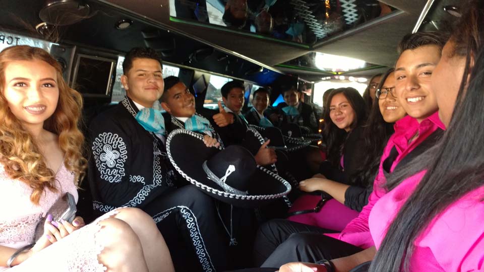 teens celebrating a birthday in a limo