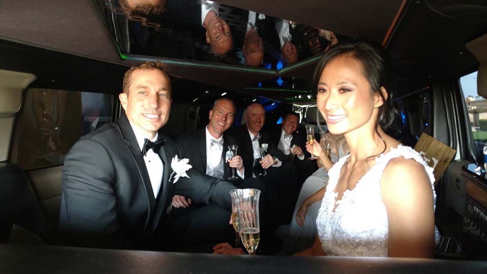 wedding party inside of a plus limos hummer limousine