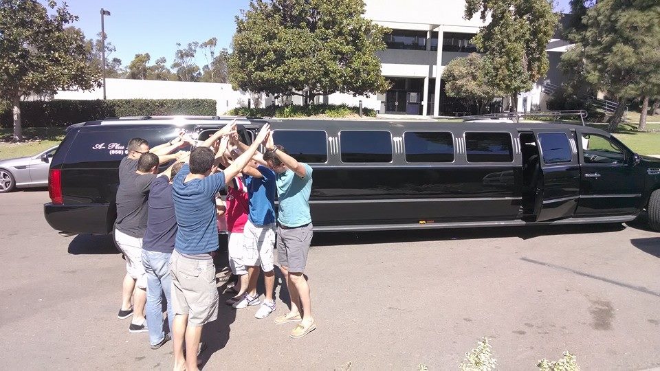 9 men celebrate a buddy's bachelor party laughing and joking in San Diego, California