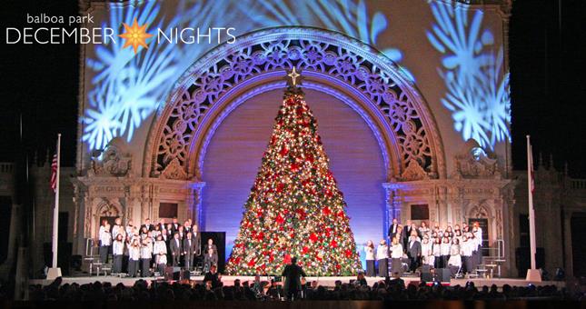 balboa park holiday celebration with christmas tree and singers