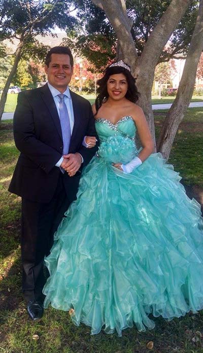 chauffeur with young woman on her 15th birthday
