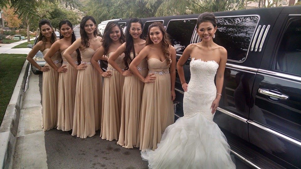 Bride and six bride's maids with black Escalade Limo