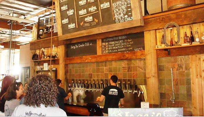 patrons at brewery line up for beer tastings