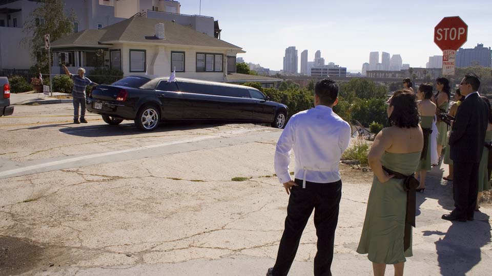 limo stuck on hill while bridal party waits