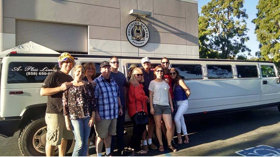 6 young women with black lincoln limo