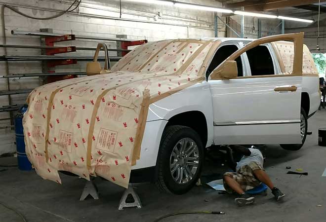 2017 Cadillac Escalade being cut in two