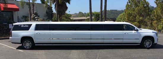 white escalade limo right side view